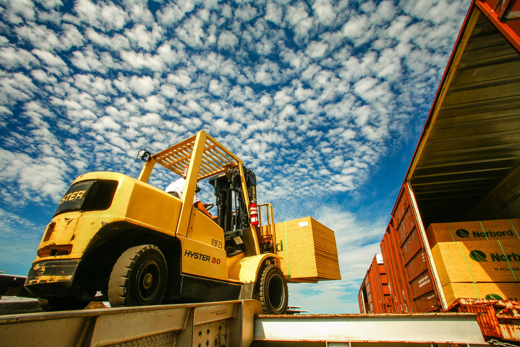 Large yellow forklift rental with pneumatic tires