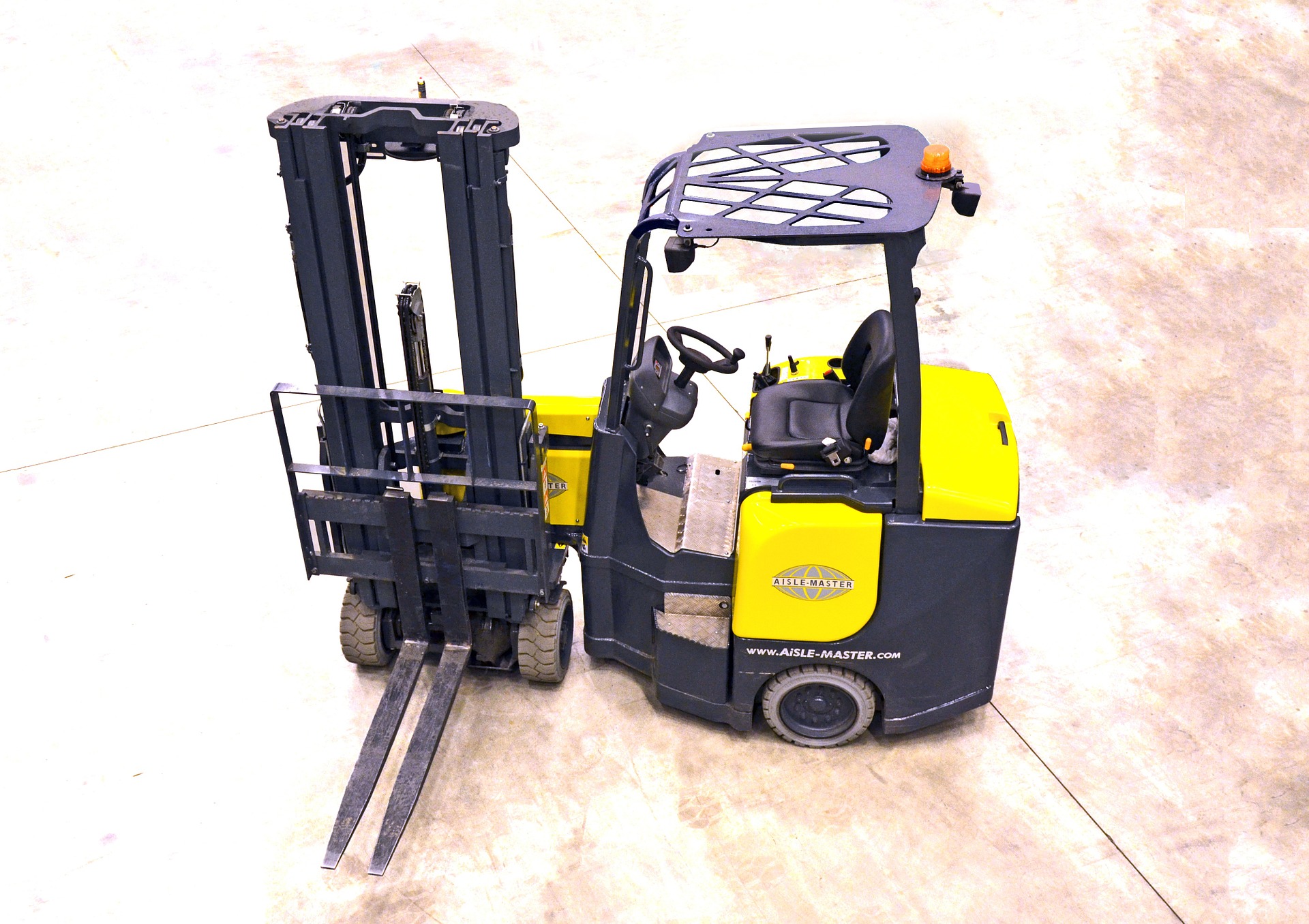 Pre-owned narrow aisle reach truck in a warehouse